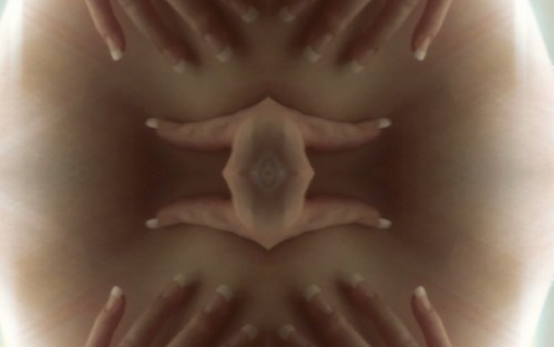 Kaleidoscopic skin and fingers image from the erotic film Kaleidogasm by Louise Lush for Bright Desire