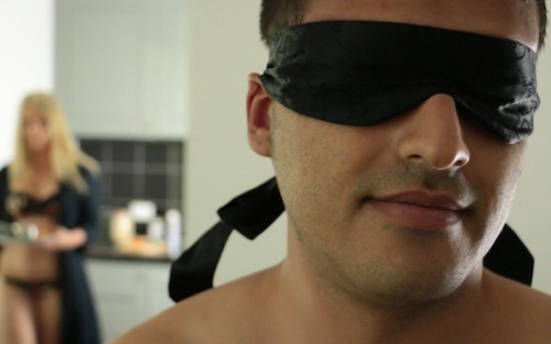 A man blindfolded in Taste, an erotic film by Louise Lush for Bright Desire